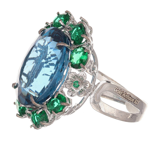 Anello argento 925 con topazio e smeraldi.