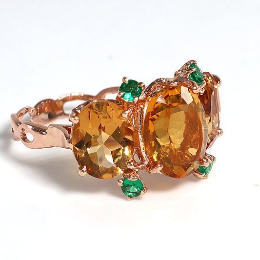 Anello Riproduzione antico con smeraldi e topazi