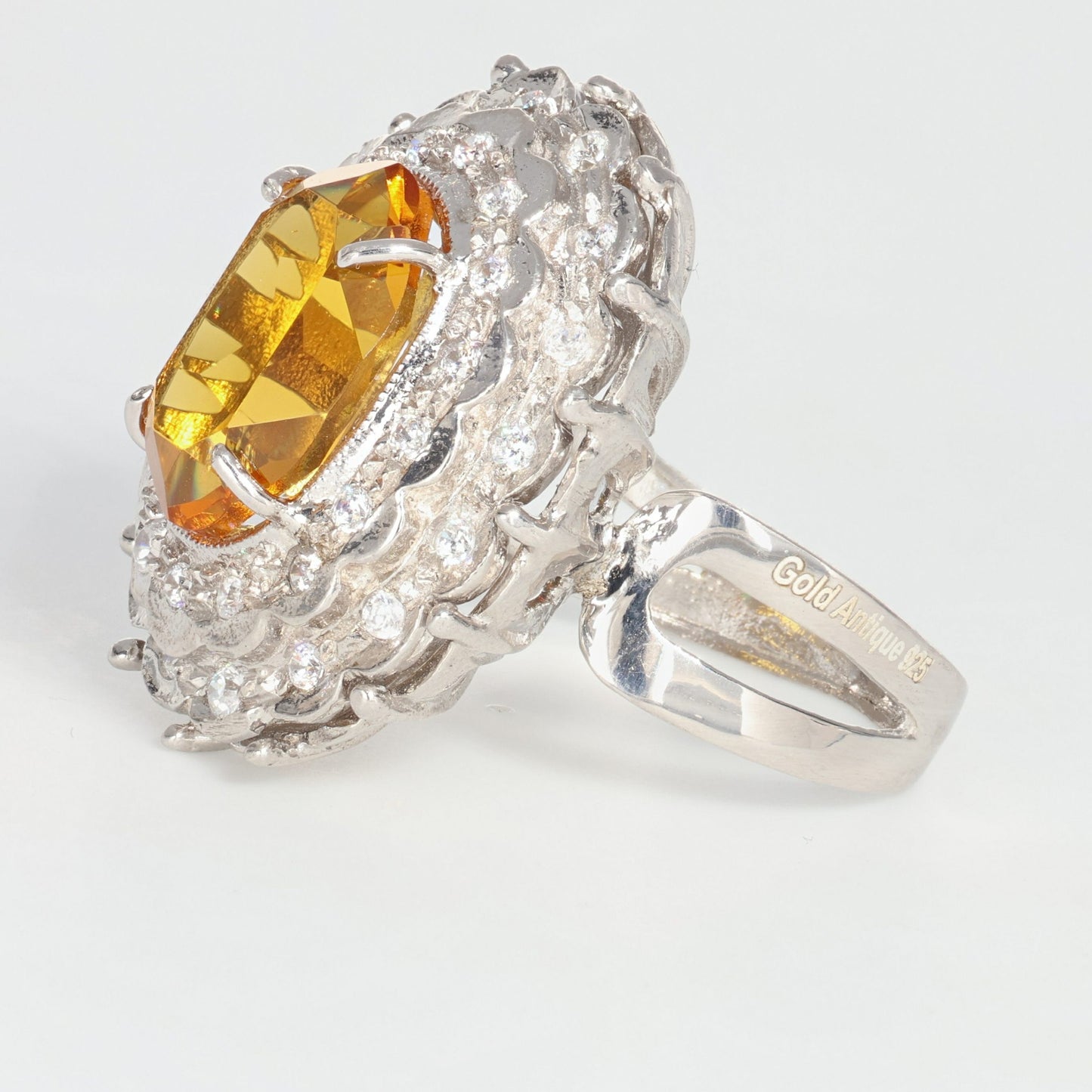 Anello argento 925 con zirconi e topazio giallo.