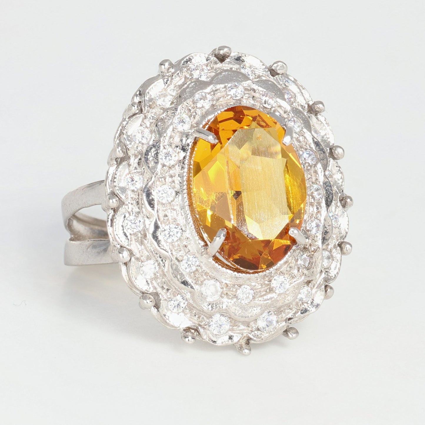 Anello argento 925 con zirconi e topazio giallo.