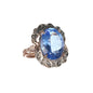 Anello Riproduzione antico con topazio azzurro e diamanti.