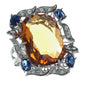 Anello in argento 925 con topazio e zaffiri.