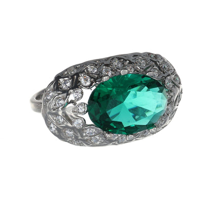 Anello argento 925 con zirconi e smeraldo.