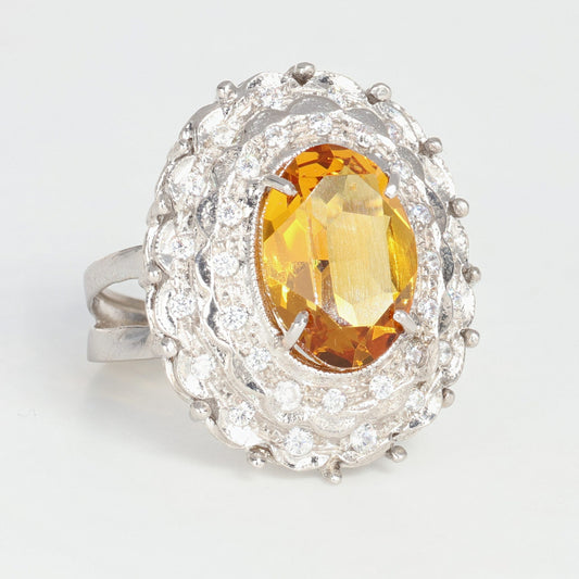 Anello argento 925 con zirconi e topazio giallo.